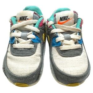 Nike Kids' Gray and White Sneakers with Blue and Yellow Accents